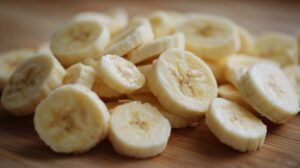 Close up of sliced bananas on a wooden surface
